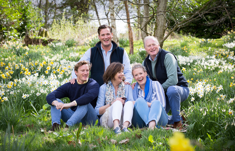 Family portrait in the garden with daffodils