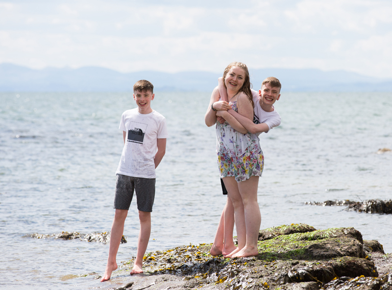 Family portrait on the beach at Lower Largo