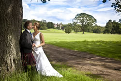 wedding photo with landscape of scone palace